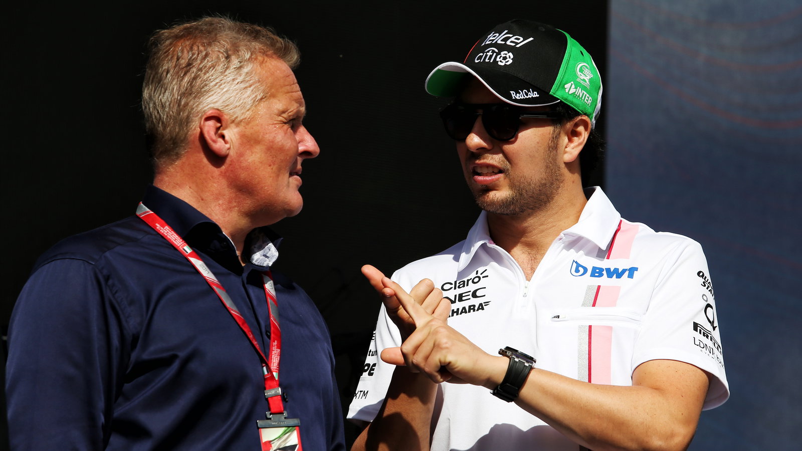 Johnny Herbert talking to Sergio Perez.