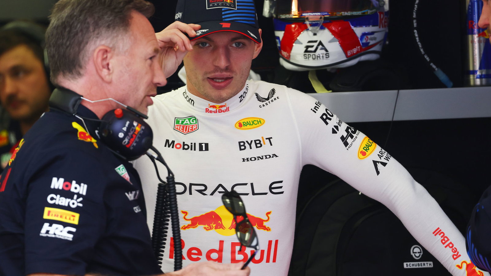 Christian Horner and Max Verstappen pictured in the Red Bull garage