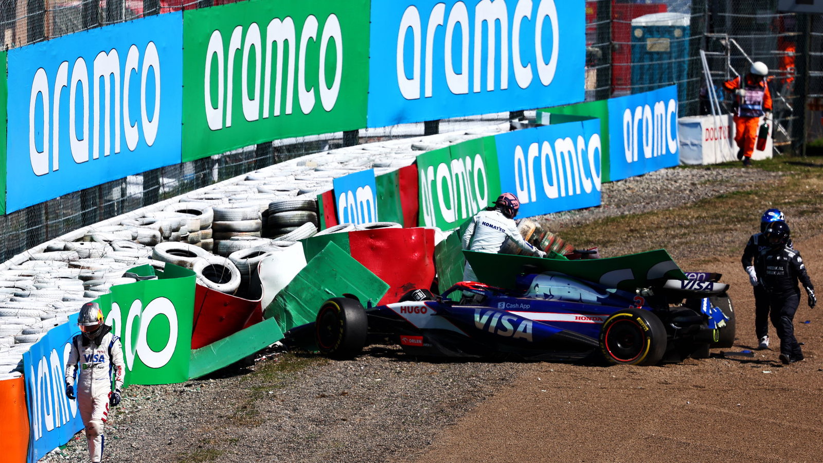 Daniel Ricciardo and Alex Albon crash at the start of the Japanese Grand Prix