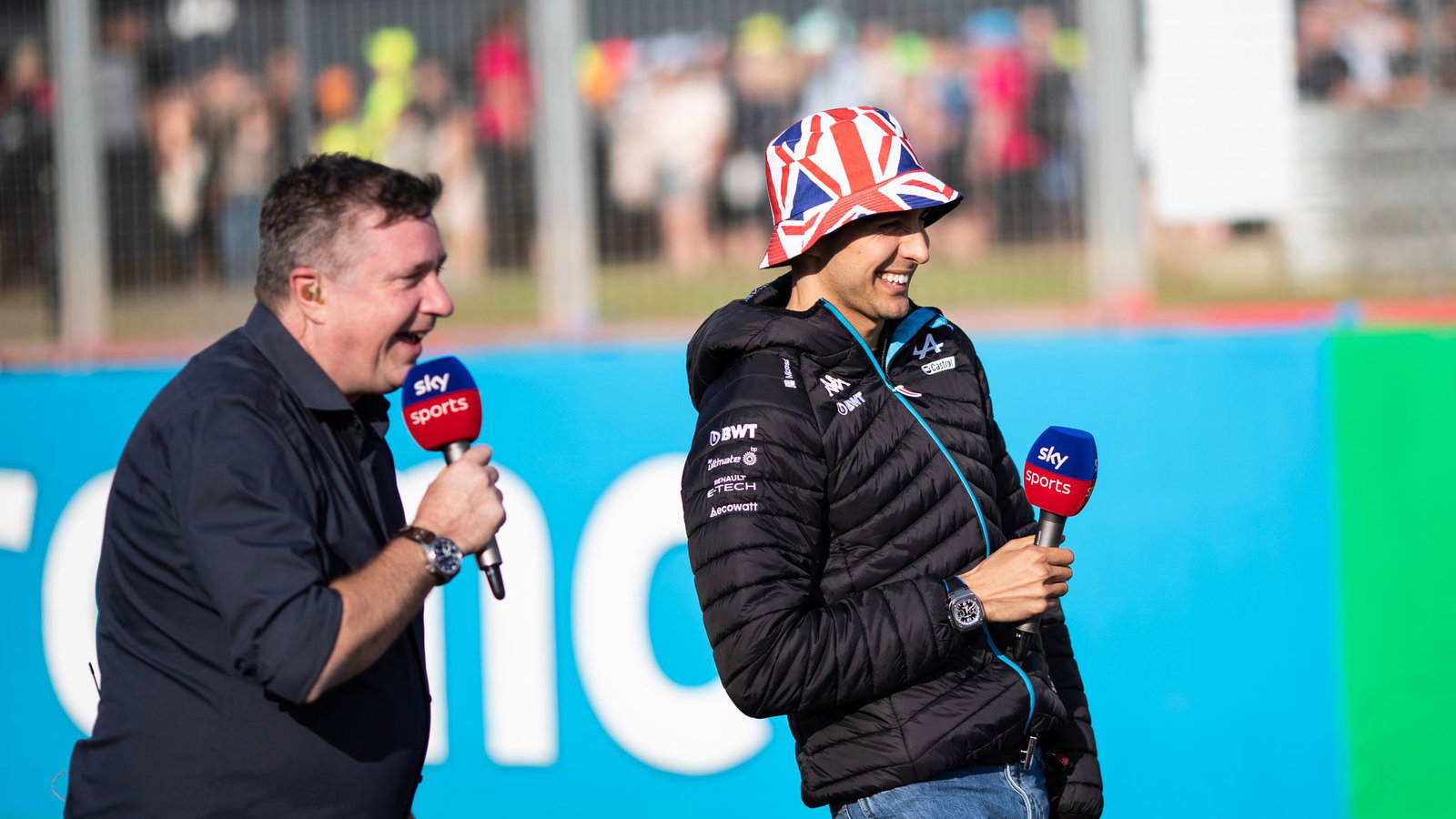 David Croft alongside Alpine driver Esteban Ocon.