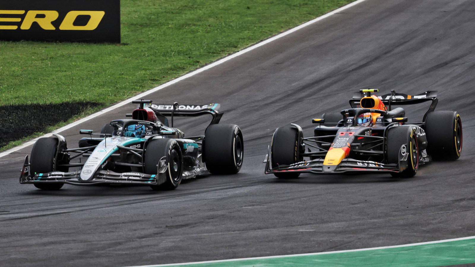George Russell and Sergio Perez do battle at Monza