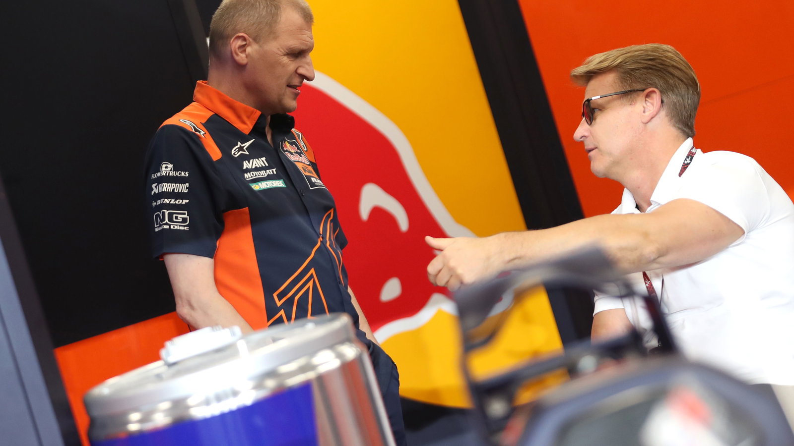 PIt Beirer, Aki Ajo, 2023 MotoGP Qatar Grand Prix, Red Bull KTM Ajo pit box. Credit: Gold and Goose.