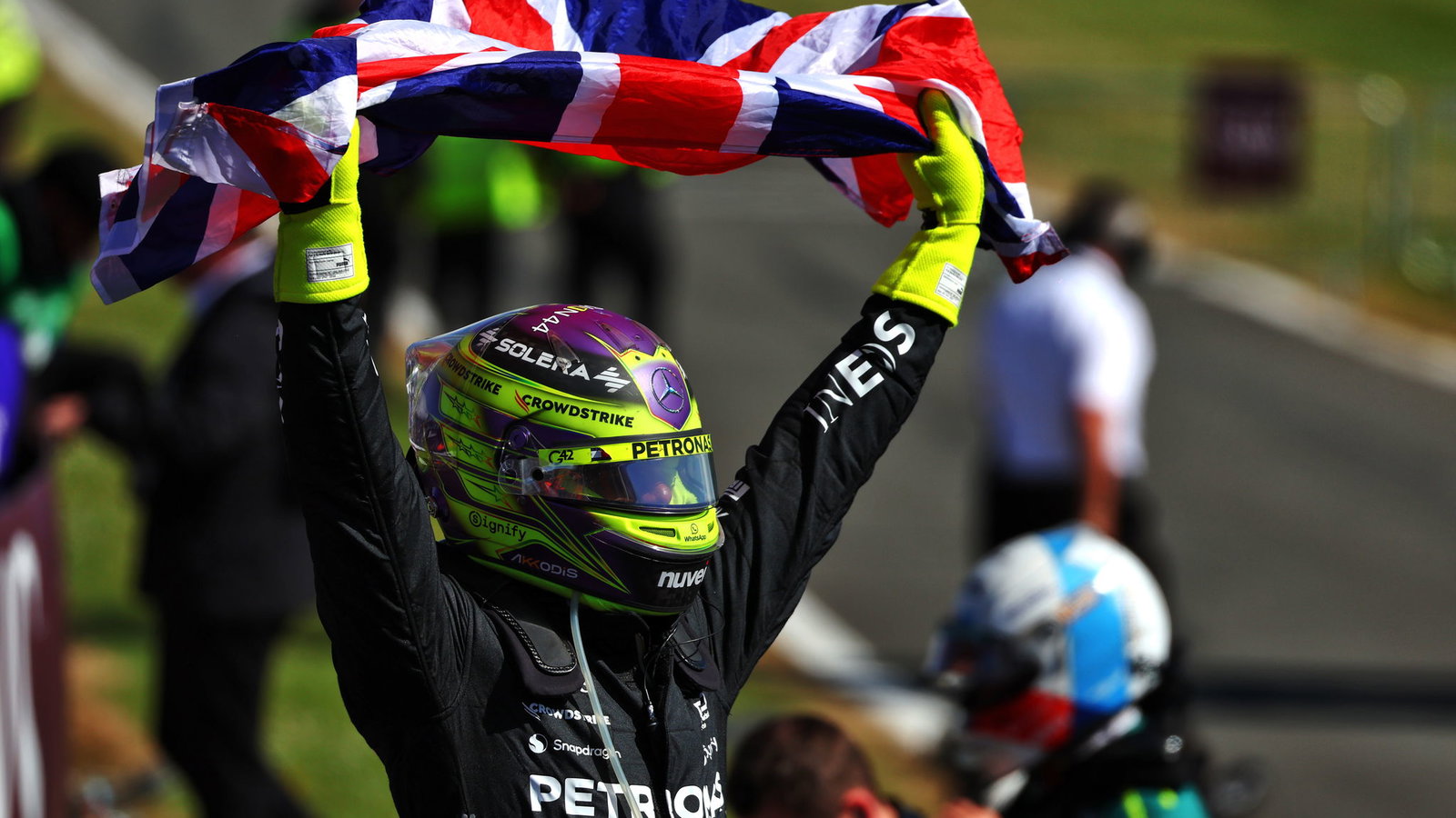 Lewis Hamilton celebrates winning the British Grand Prix for a ninth time