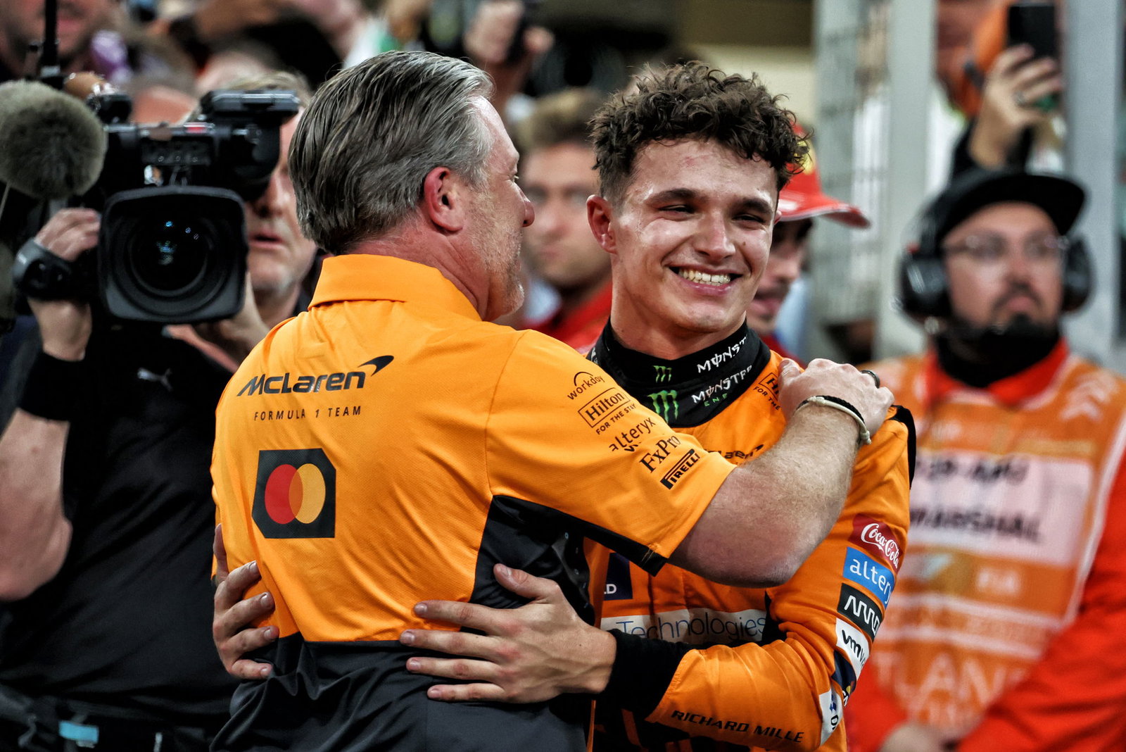 Lando Norris celebrates winning in Abu Dhabi