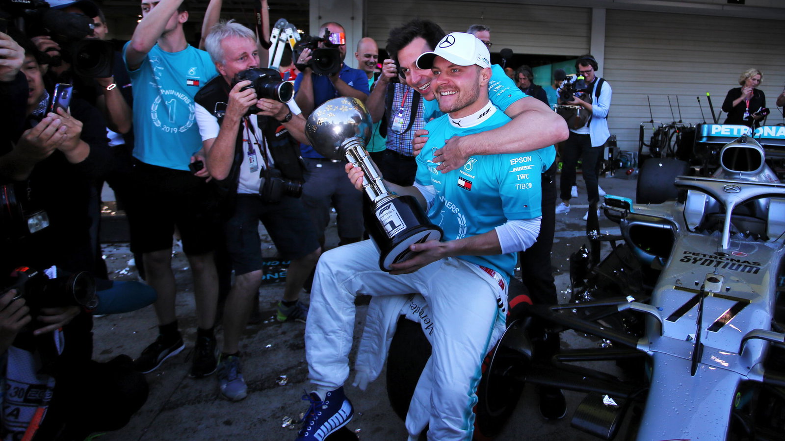 Toto Wolff and Valtteri Bottas celebrate at the 2019 Japanese GP