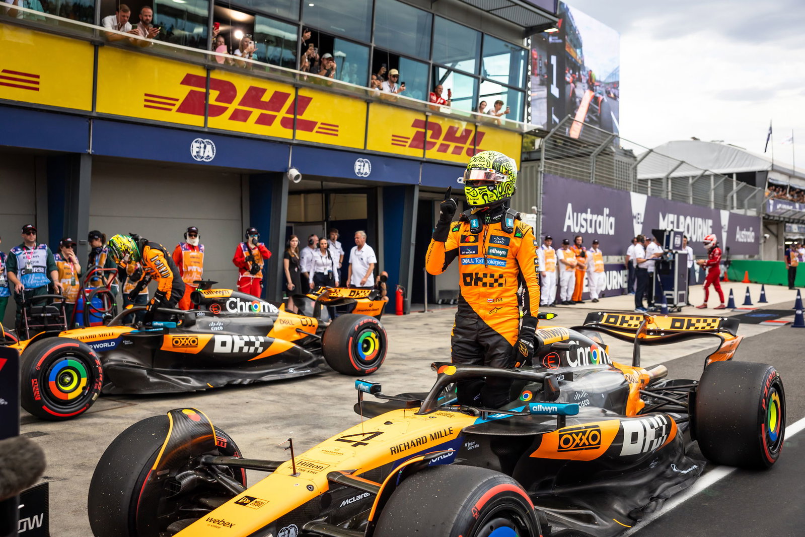 Lando Norris celebrates taking pole position
