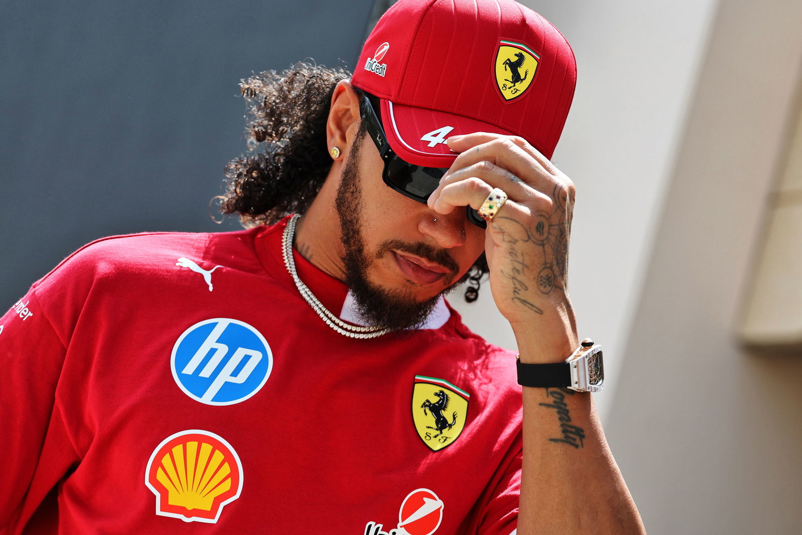 Lewis Hamilton arrives in the Bahrain paddock on Thursday 