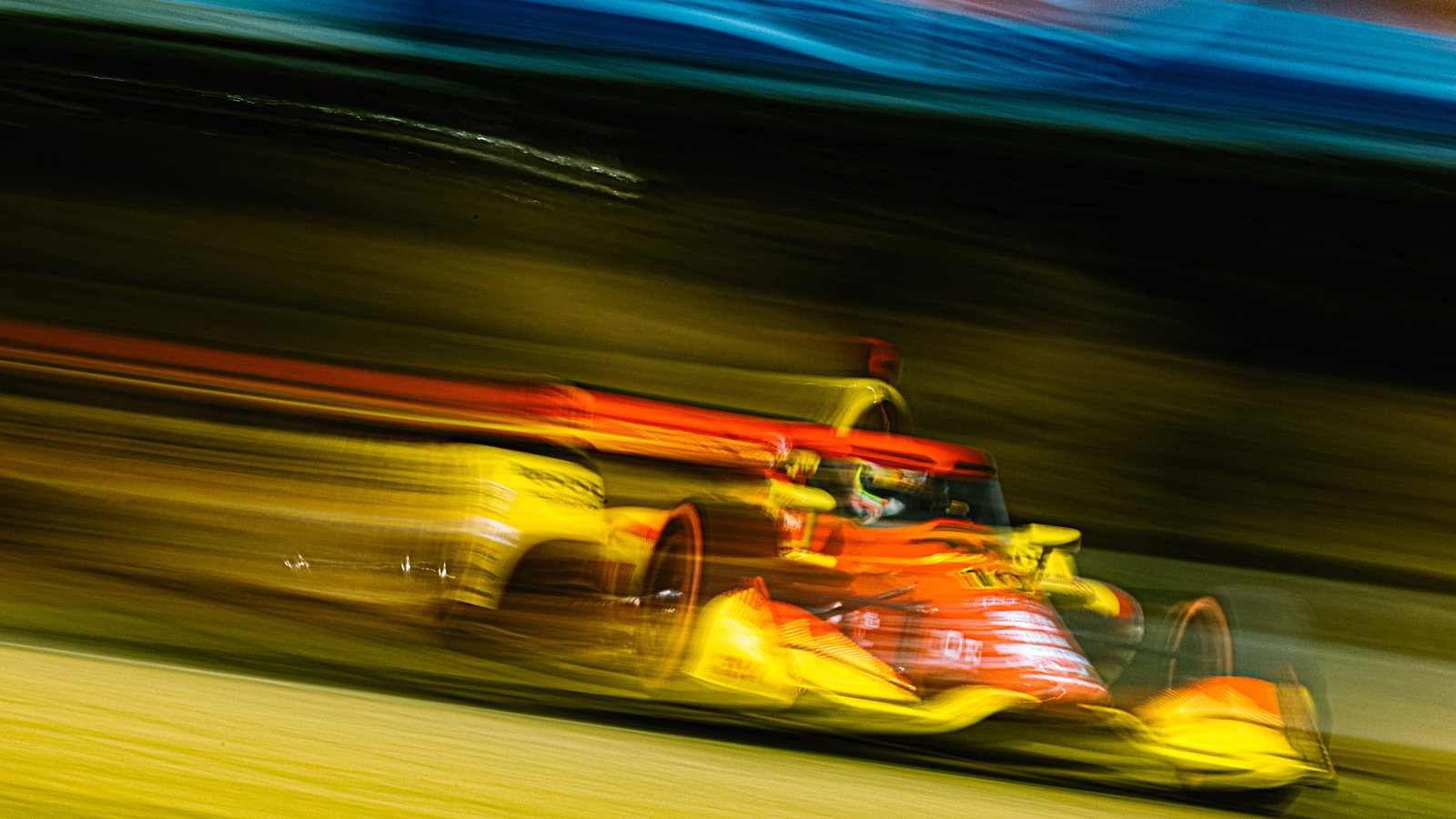 Alex Palou driving around Laguna Seca.