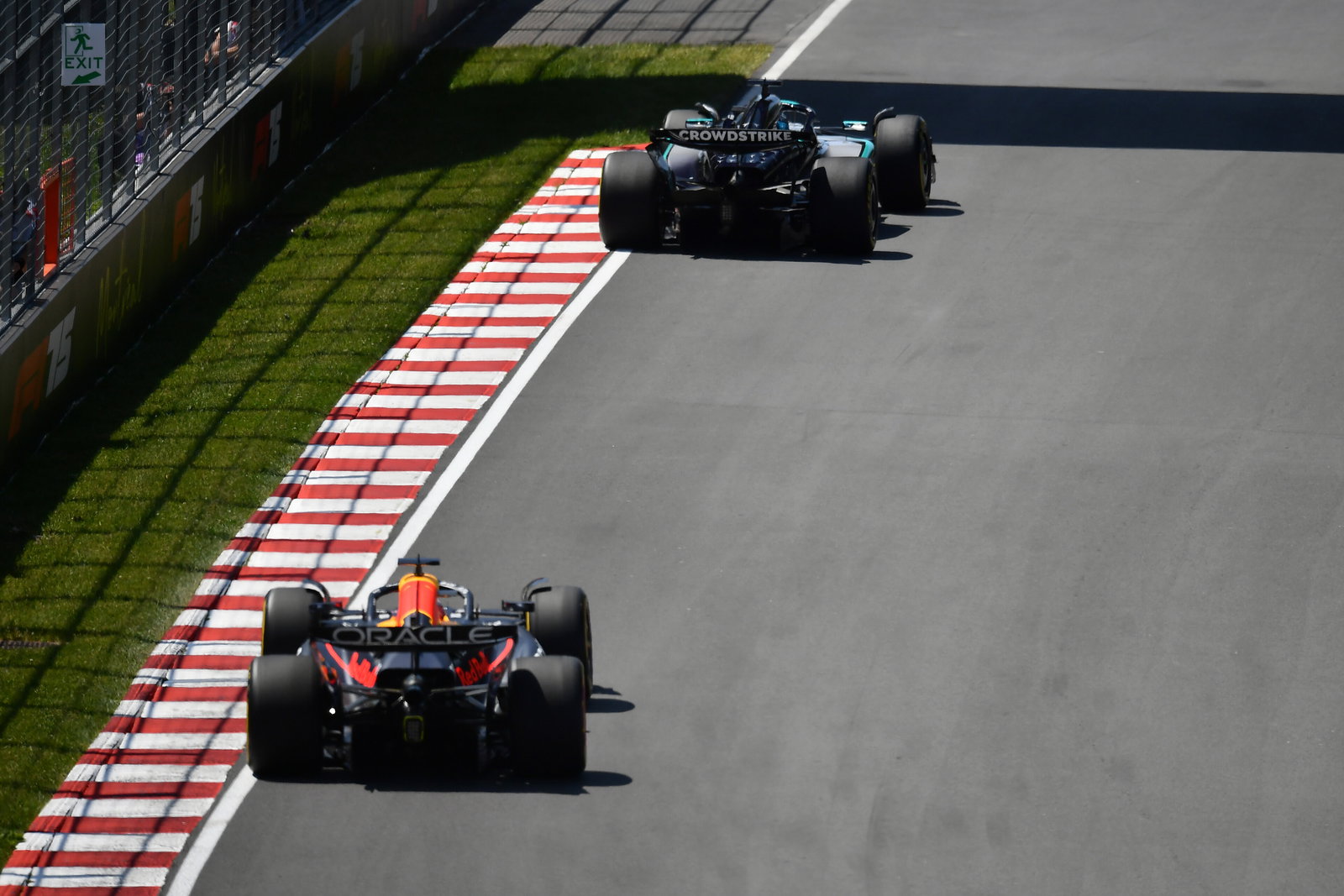 George Russell and Max Verstappen on track at the Canadian GP