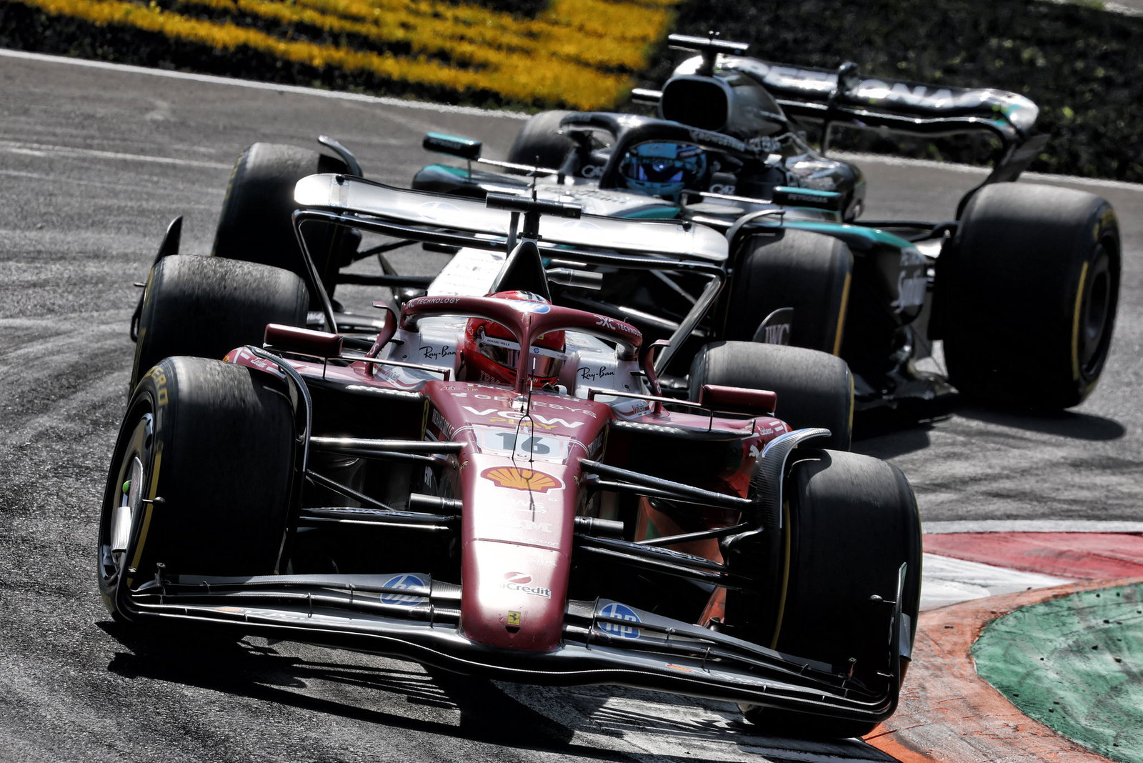 Charles Leclerc ahead of George Russell 