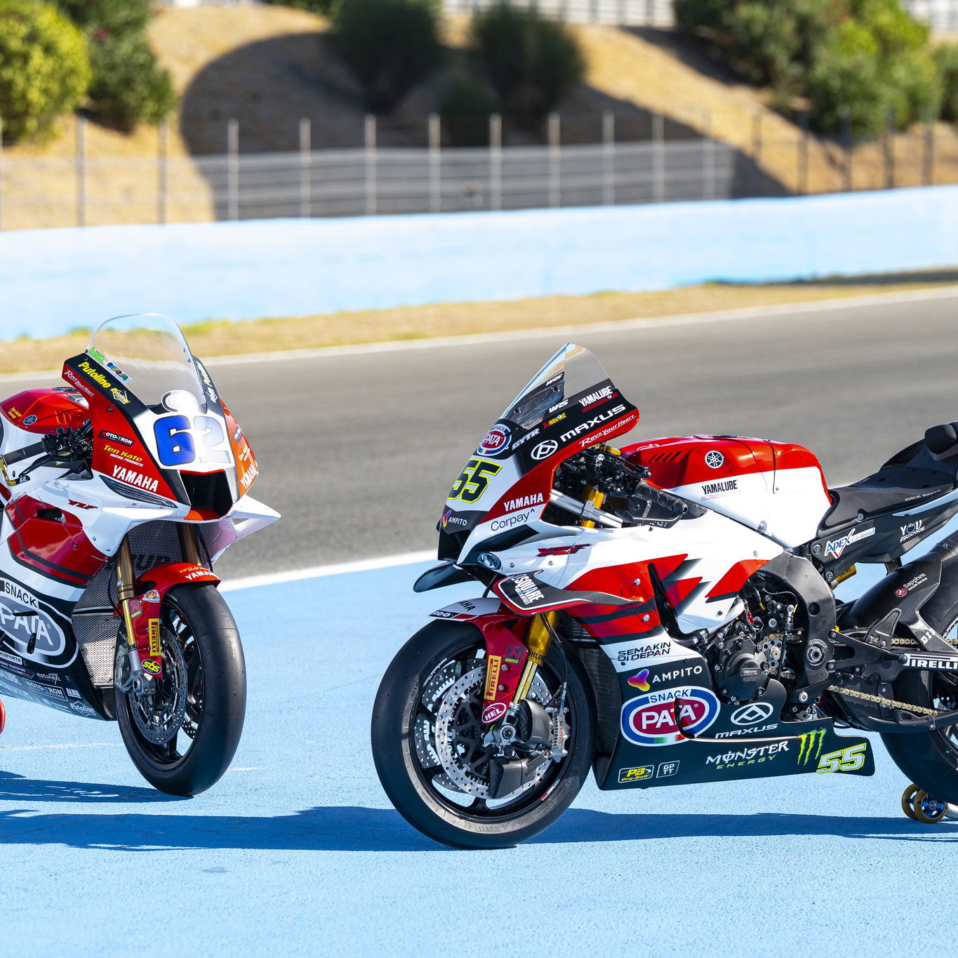 Stefano Manzi's Yamaha R9 and Andrea Locatelli's Yamaha R1 in Yamaha 70th anniversary colours, 2025 Spanish WorldSBK. Credit: Yamaha.
