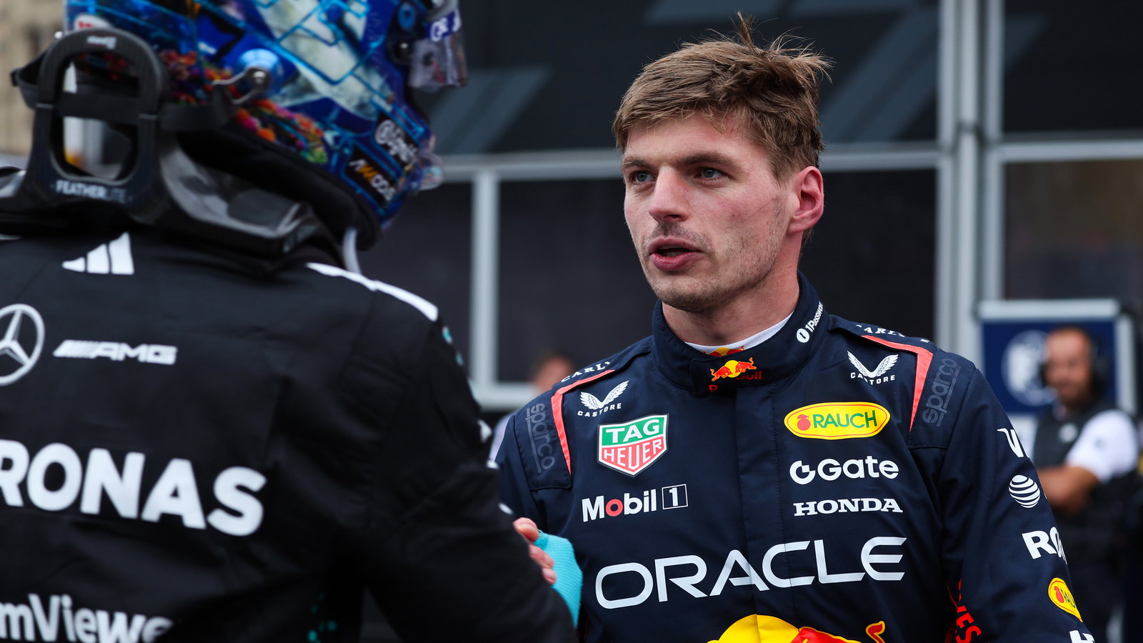 Verstappen is congratulated by Russell