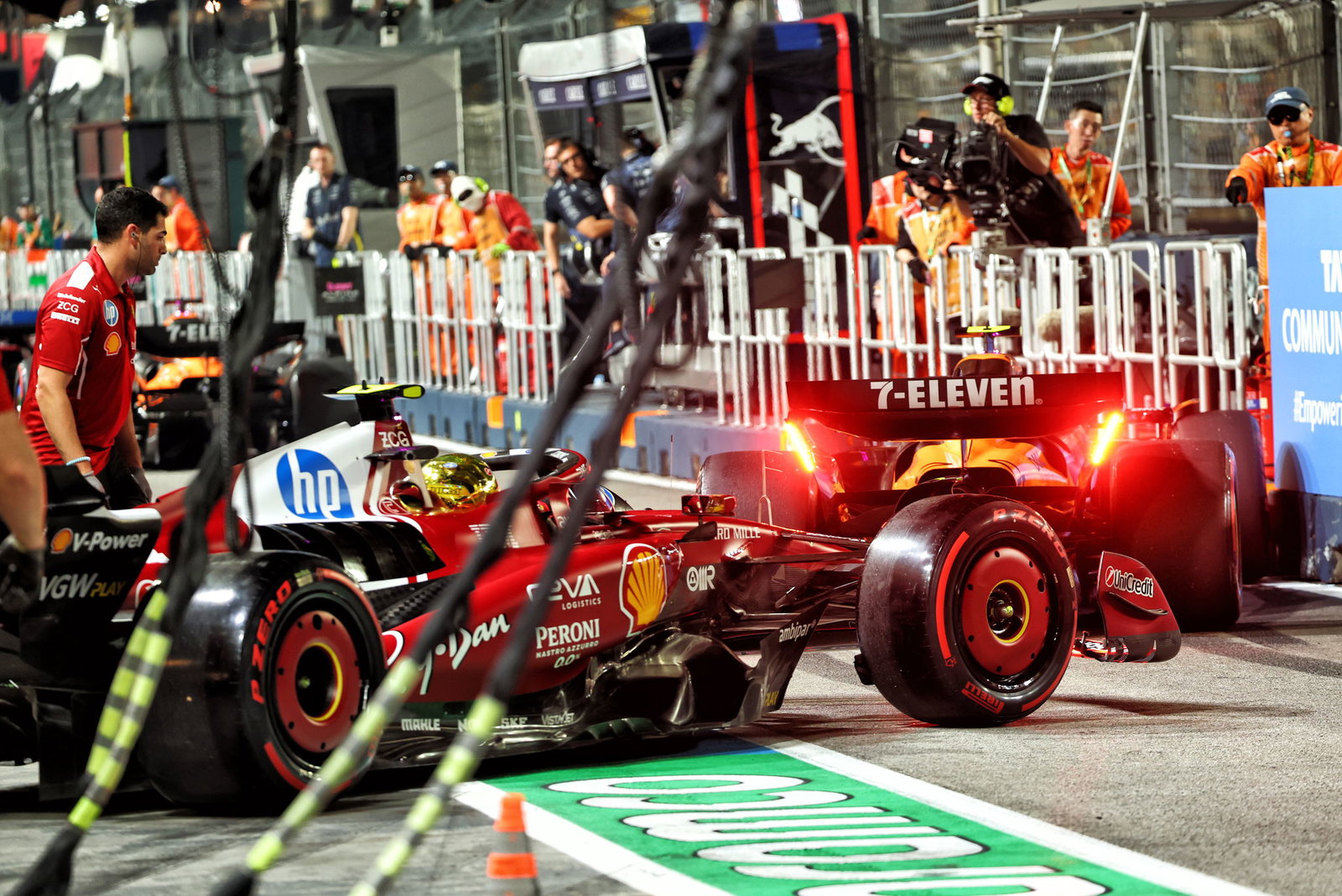 Norris was pushed into the pit wall 