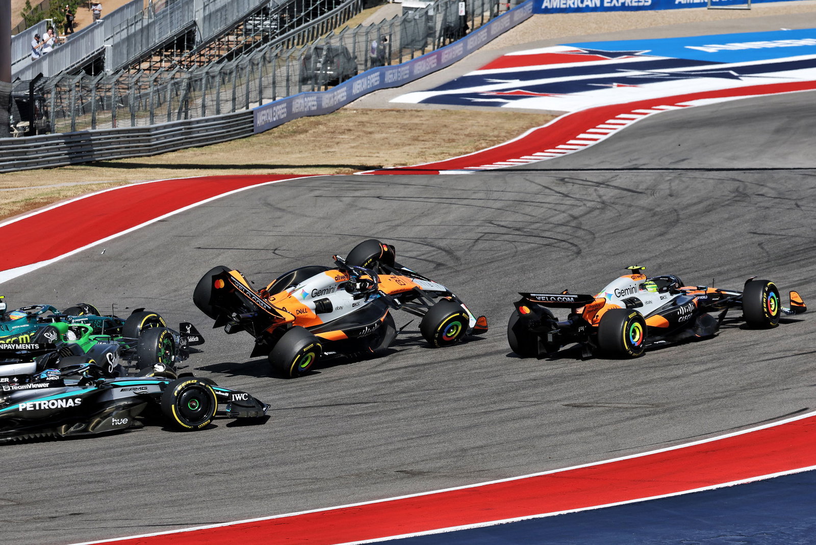 The Turn 1 incident wiped out both McLarens