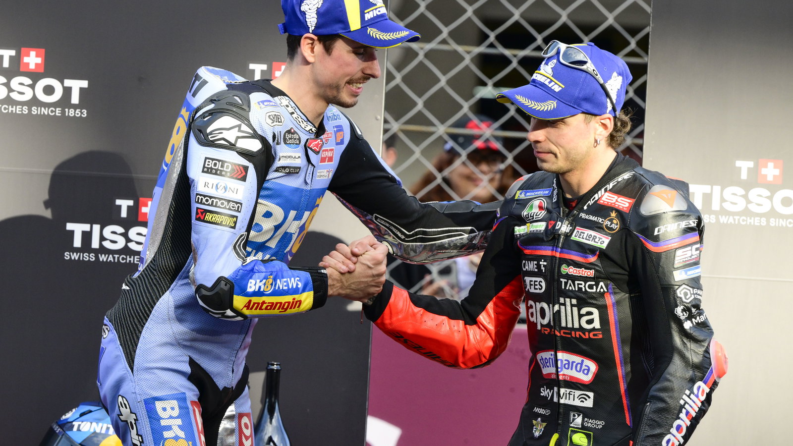 Alex Marquez, Marco Bezzecchi, 2025 MotoGP Portuguese Grand Prix, Sprint podium. Credit: Gold and Goose.