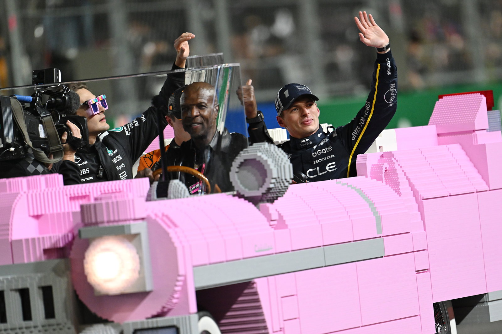 Terry Crews drives F1 stars in full-size LEGO Cadillac after Las