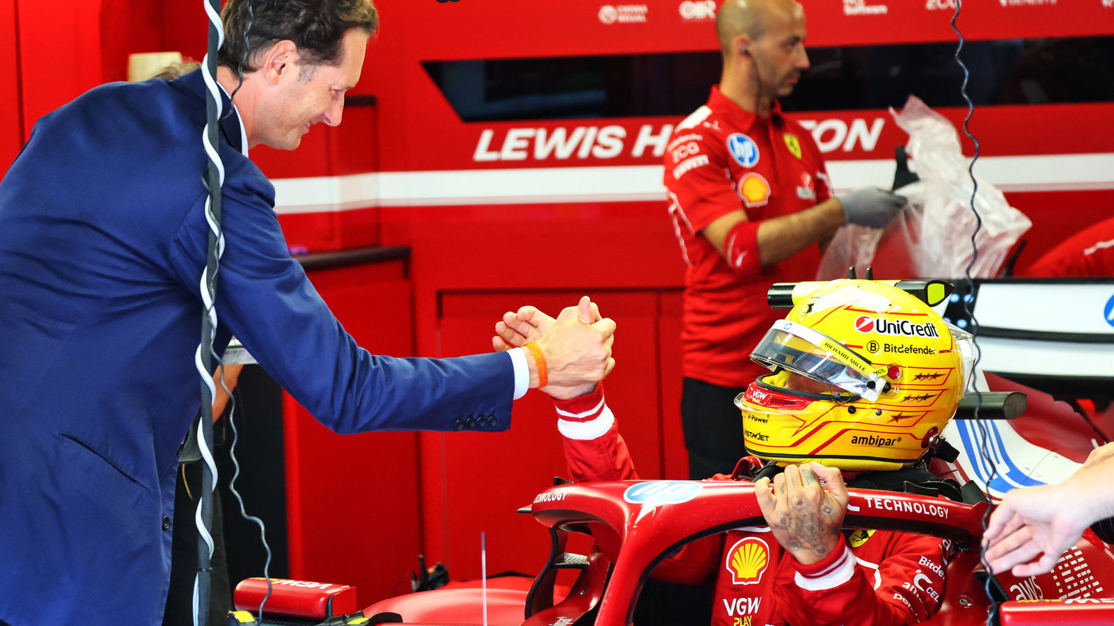John Elkann and Lewis Hamilton 