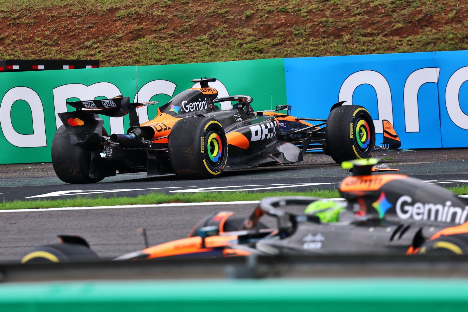 Norris passes his crashed teammate Piastri 