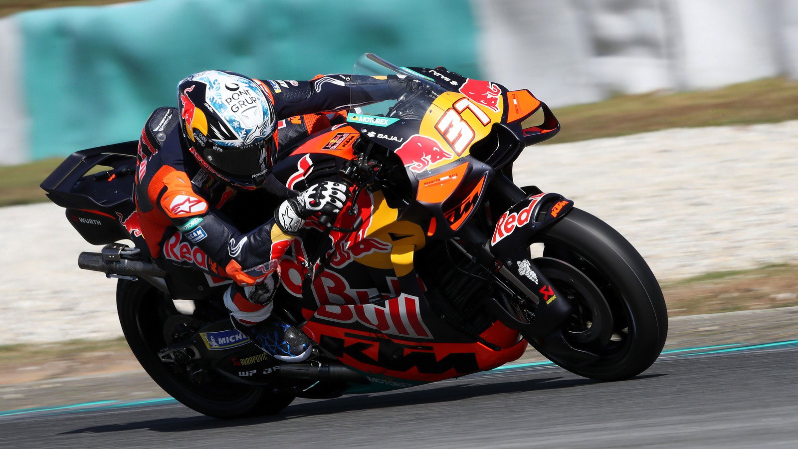 Pedro Acosta and his RC16 compress on corner exit, 2026 Sepang MotoGP Test (Gold&Goose).