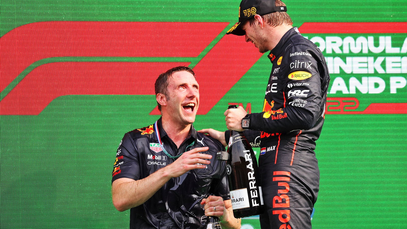 Craig Skinner and Max Verstappen on the F1 podium 