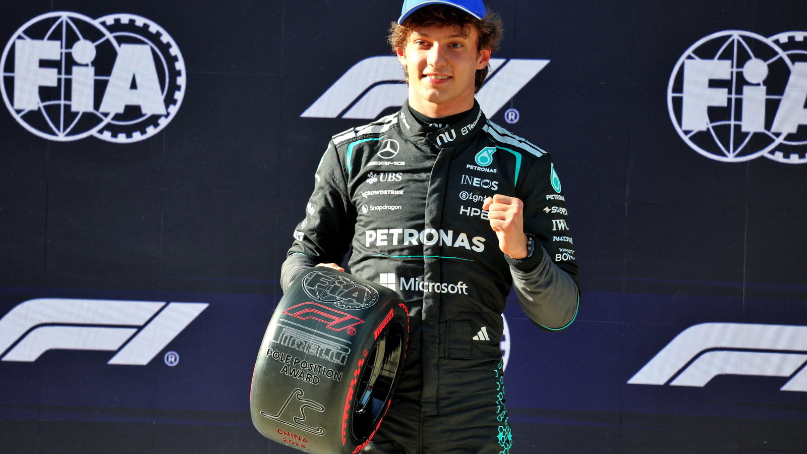 Antonelli celebrates after becoming F1's youngest pole-sitter in China