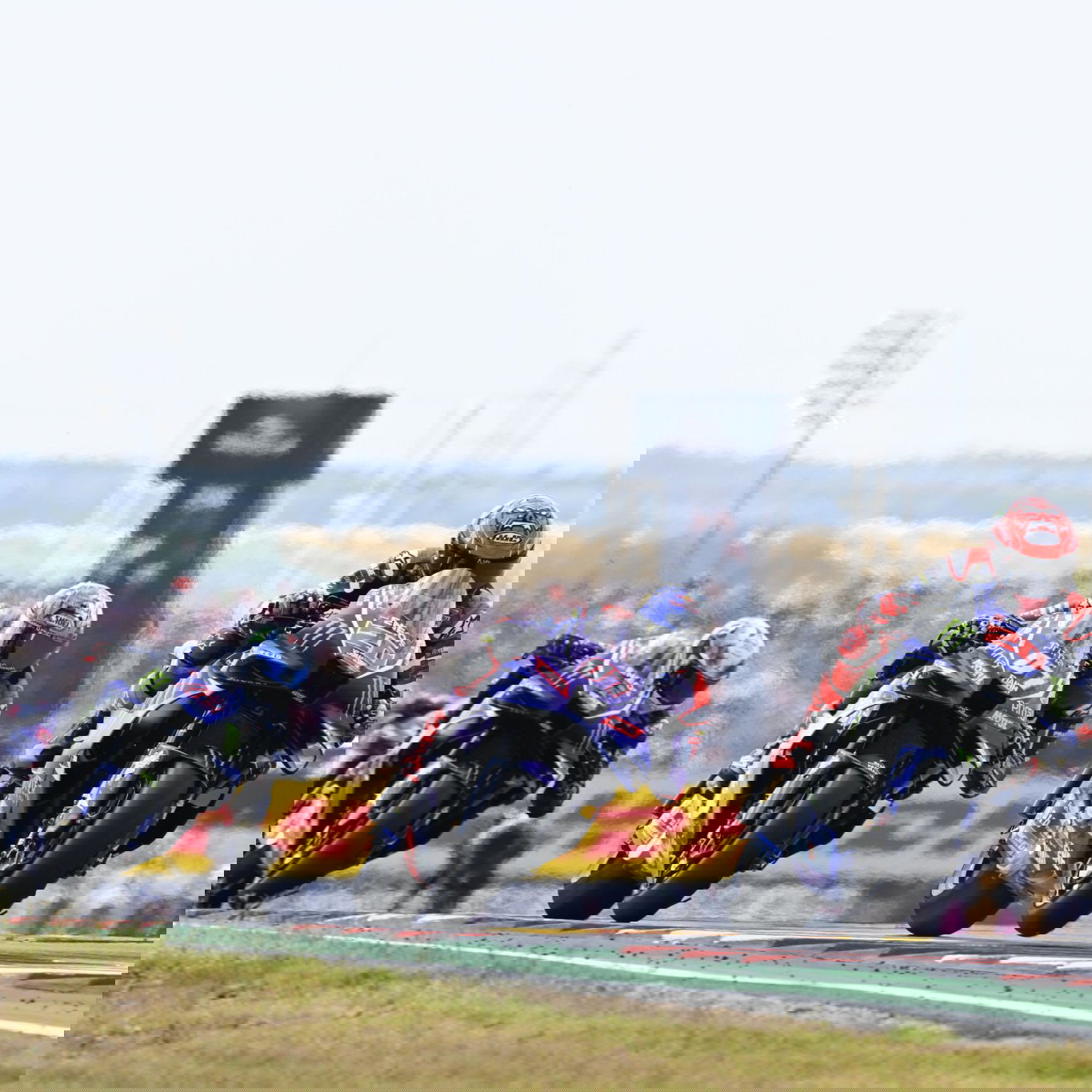 Fabio Quartararo leads Toprak Razgatioglu and Alex Rins, 2026 MotoGP US Grand Prix. Credit: Gold and Goose.