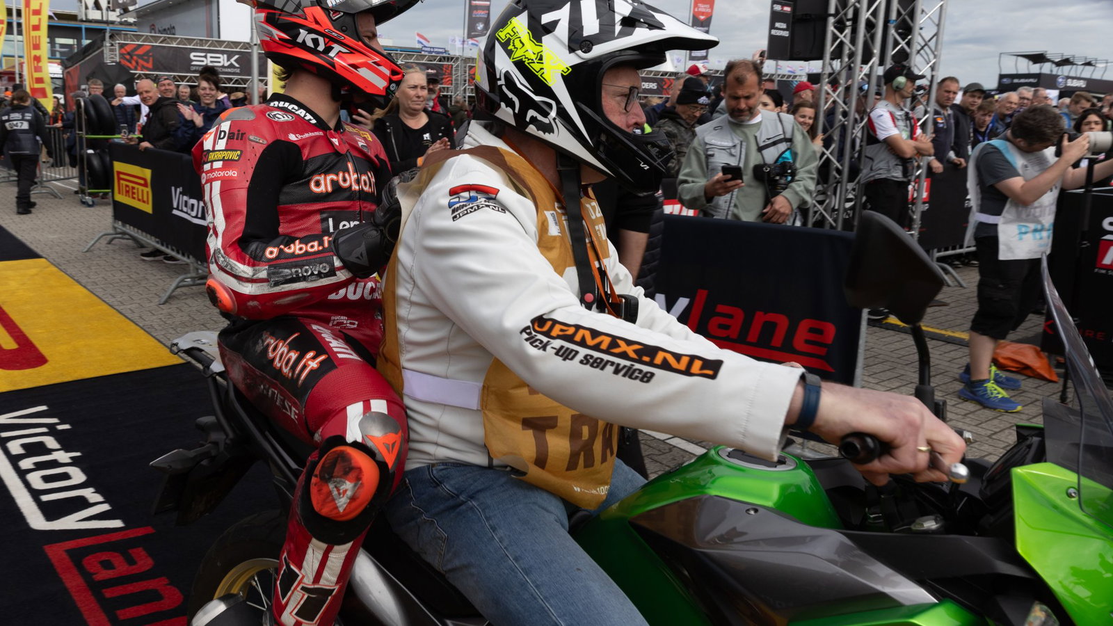 Nicolo Bulega arrives in parc ferme on a scooter after crashing in 2026 Dutch WorldSBK Superpole. Credit: Gold and Goose.