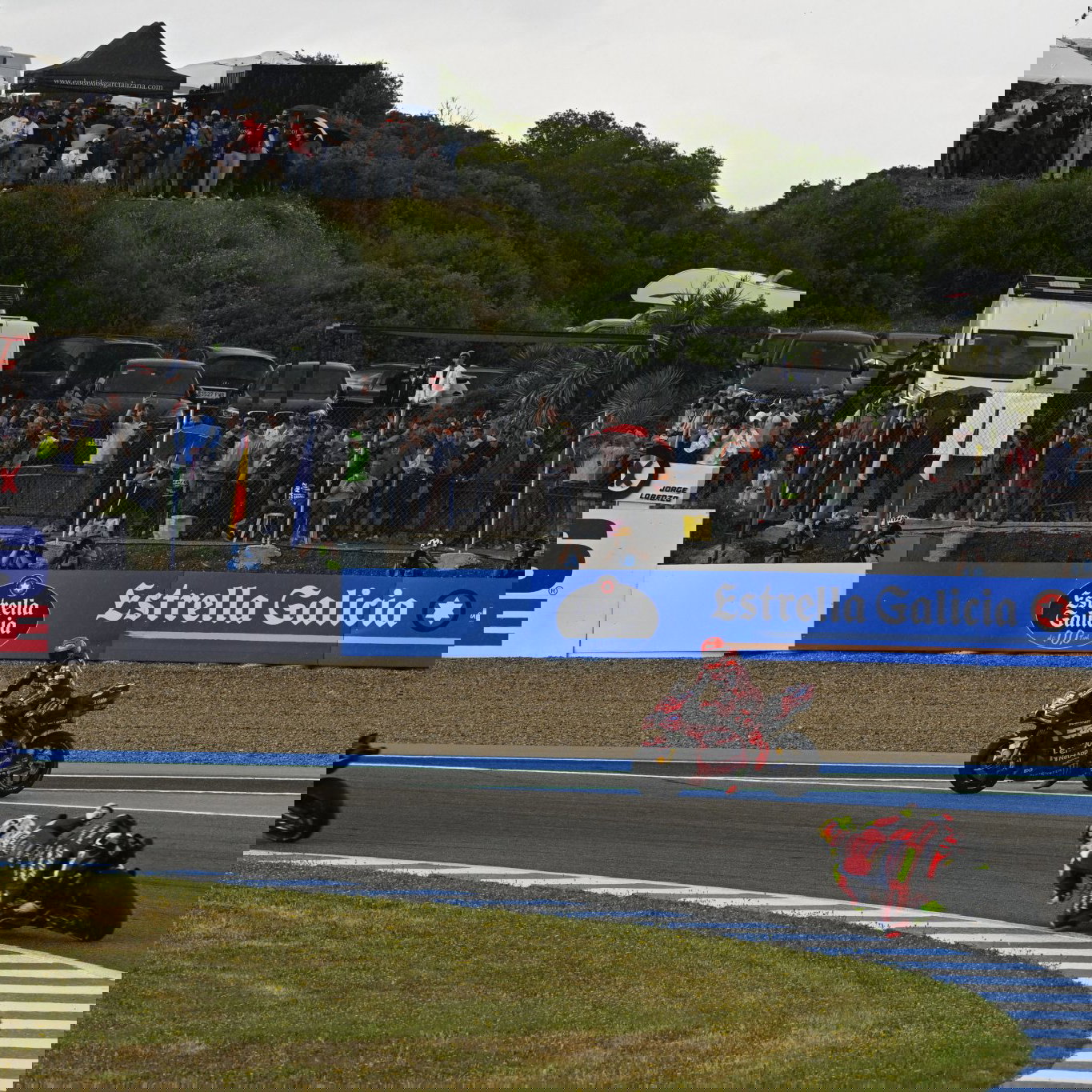 Marc Marquez waits to cross the track after crashing in 2026 Spanish MotoGP Sprint. Credit: Gold and Goose.