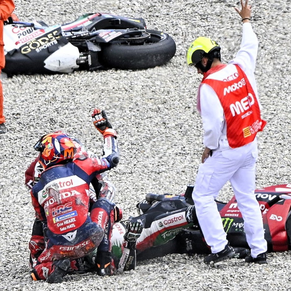 Luca Marini, Pecco Bagnaia help Johann Zarco after Turn 1 crash, 2026 Catalan MotoGP.