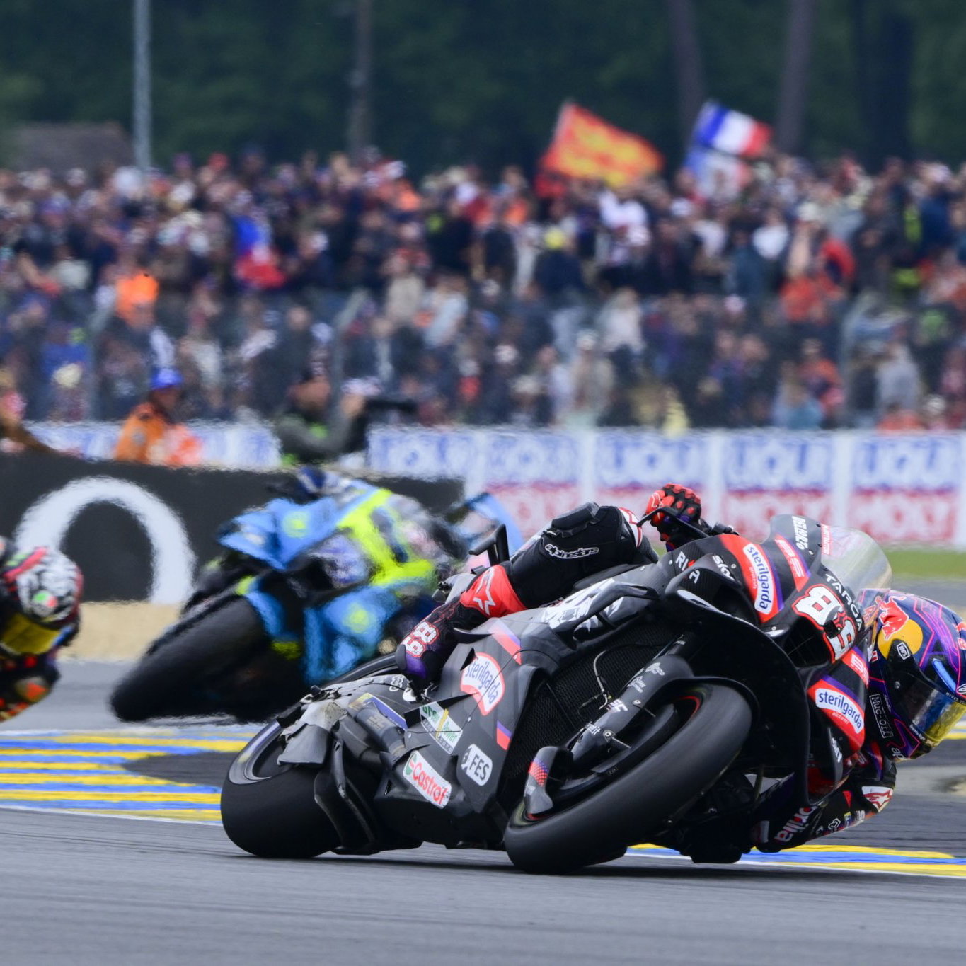 Jorge Martin leads Marco Bezzecchi, Ai Ogura, 2026 MotoGP French Grand Prix. Credit: Gold and Goose.