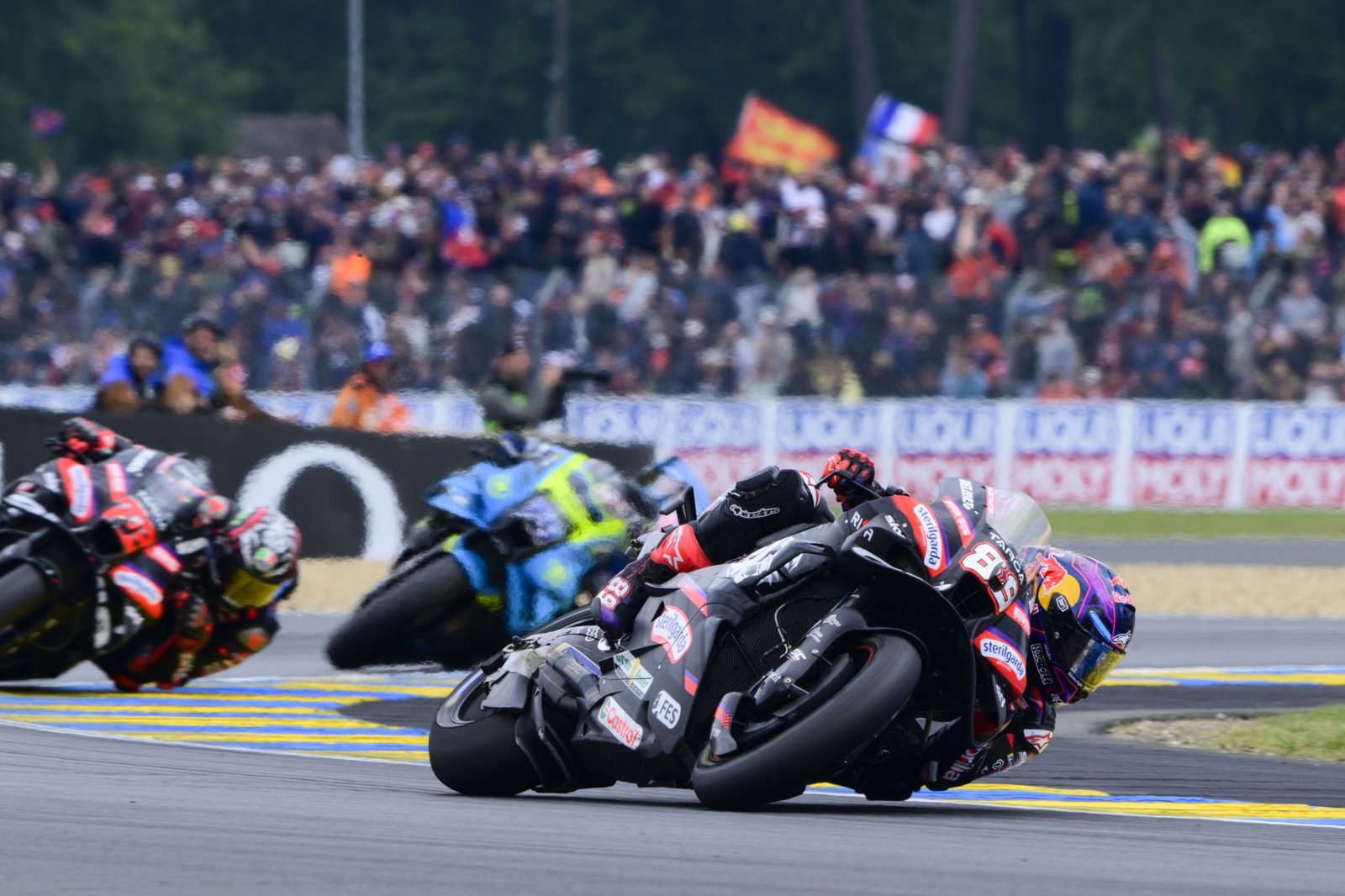 Jorge Martin leads Marco Bezzecchi, Ai Ogura, 2026 MotoGP French Grand Prix. Credit: Gold and Goose.