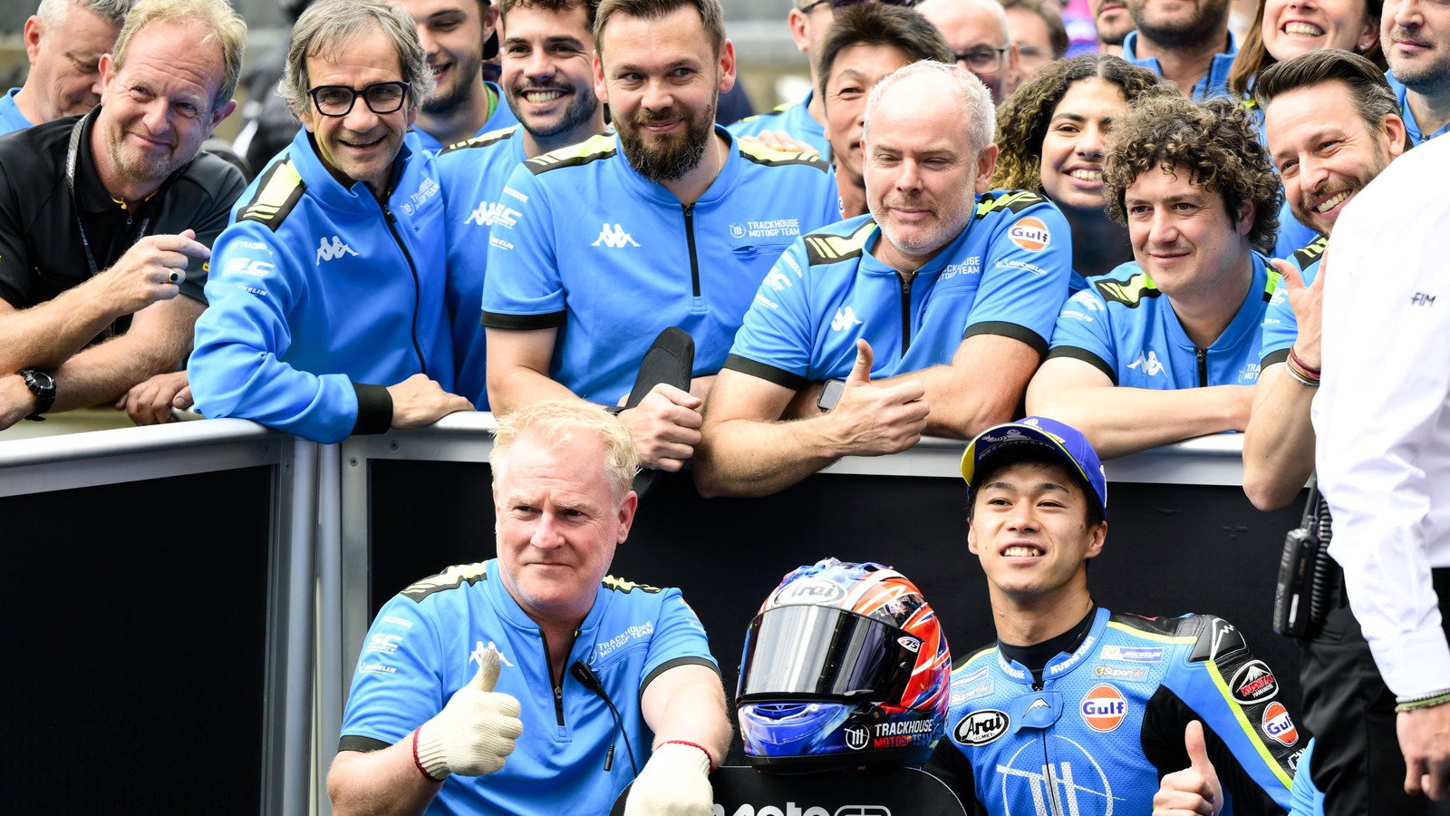 Davide Brivio looks on as Ai Ogura celebrates a first MotoGP podium, Le Mans 2026.
