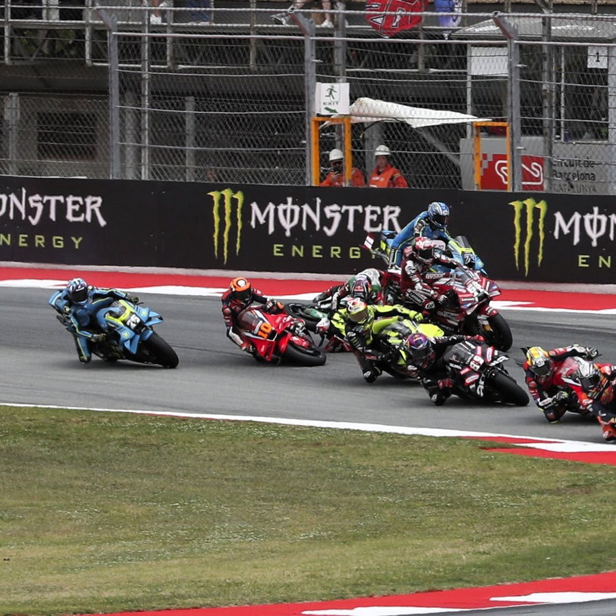 Zarco falls into Bagnaia, Marini. Turn 1, 2026 Catalan MotoGP.