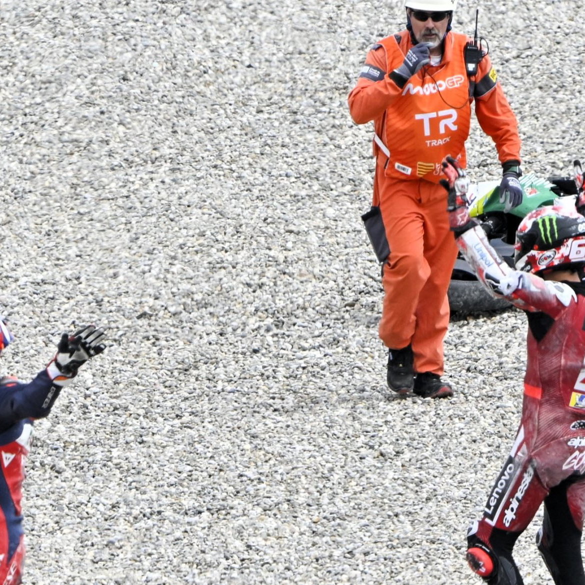 Marini, Bagnaia call for assistance for Zarco after Turn 1 crash, 2026 Catalan MotoGP.