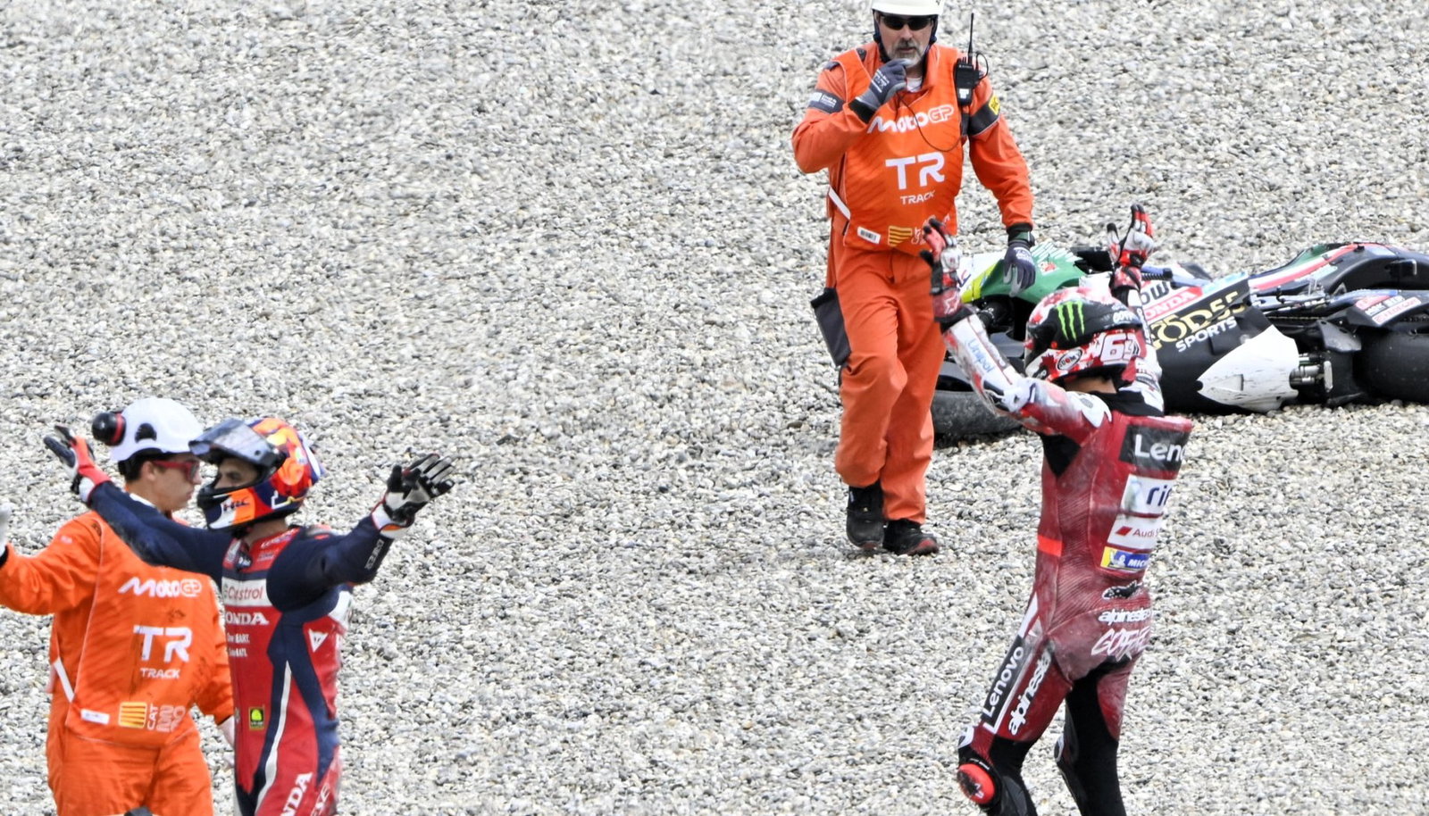 Marini, Bagnaia call for assistance for Zarco after Turn 1 crash, 2026 Catalan MotoGP.