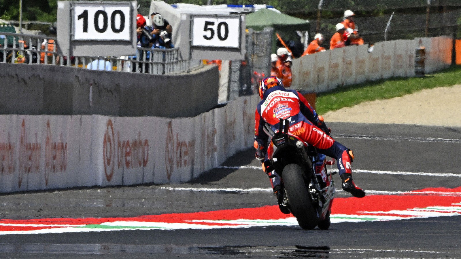 Luca Marini making the kind of leg off move he should have done before pulling into pit lane, 2026 Italian MotoGP.