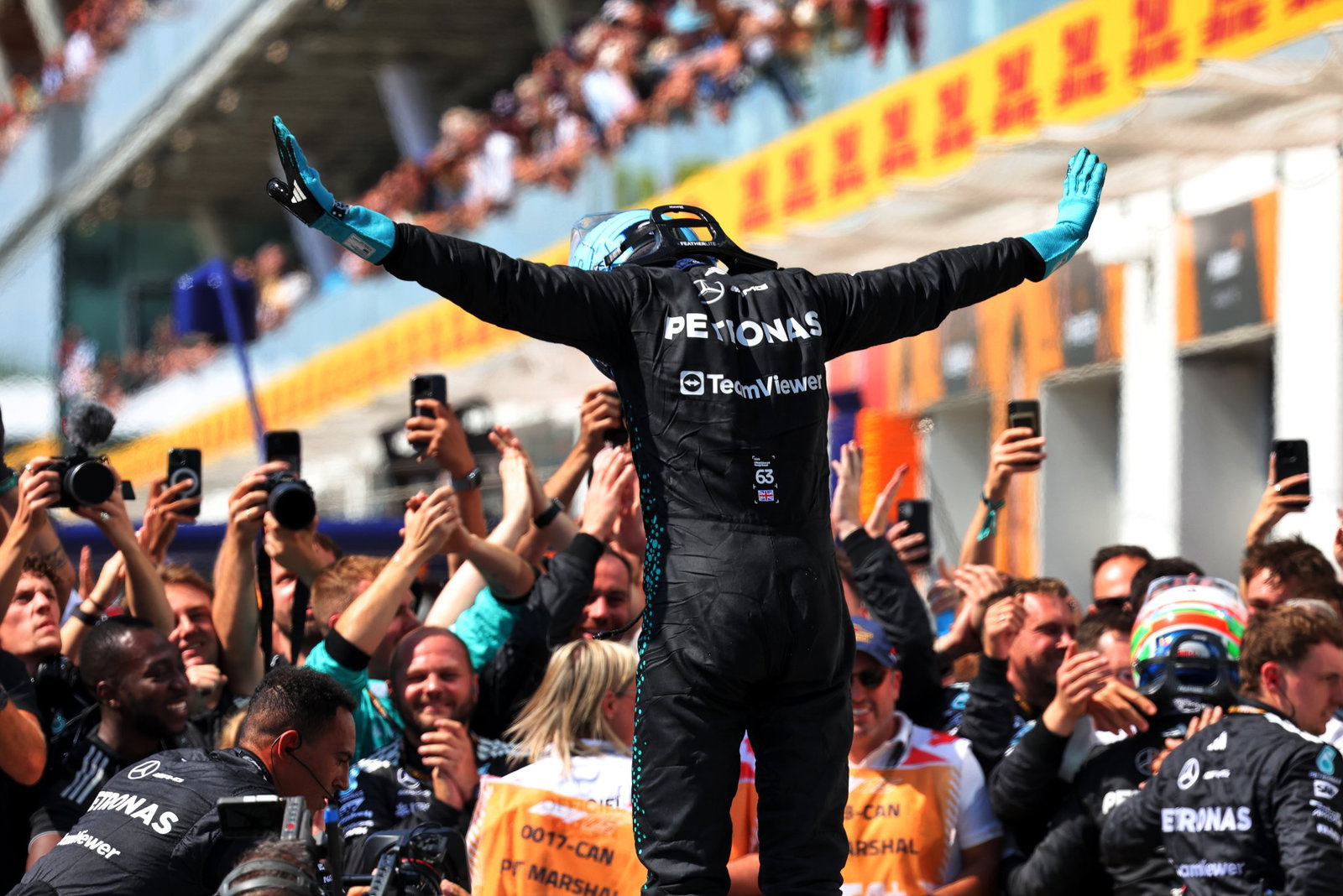 Russell celebrates his 2025 win in Canada