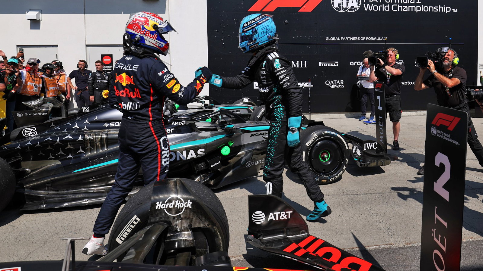 Russell and Verstappen shake hands in Canada