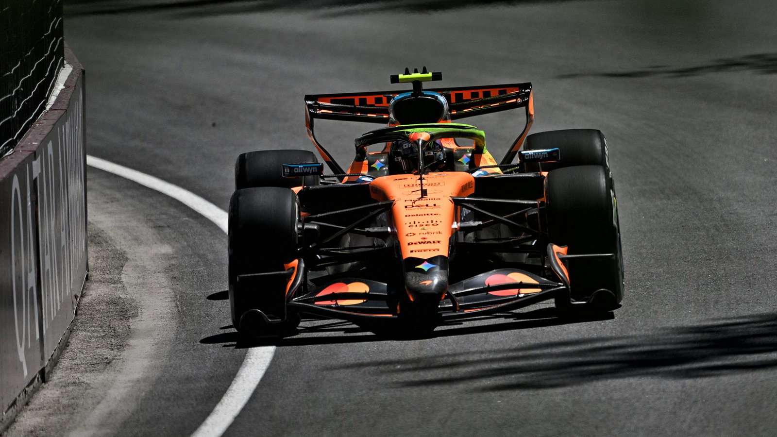 Norris tested the new front wing in practice (pictured here)