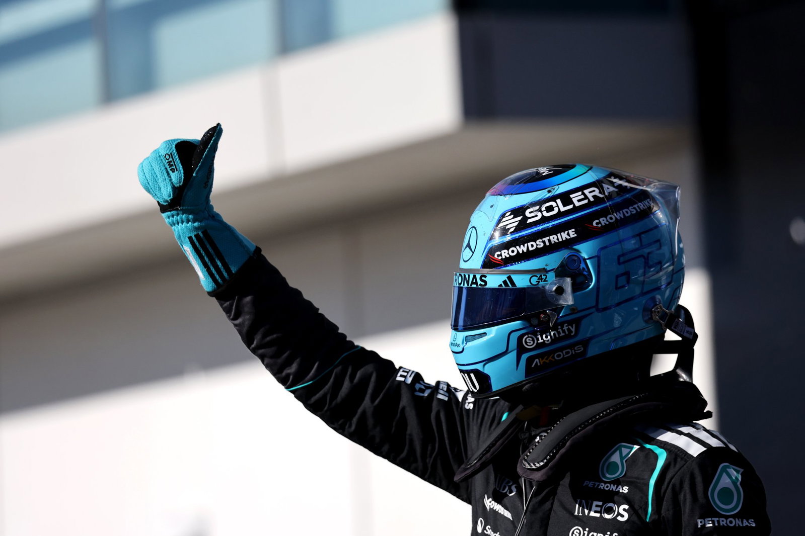 Russell celebrates his sprint pole