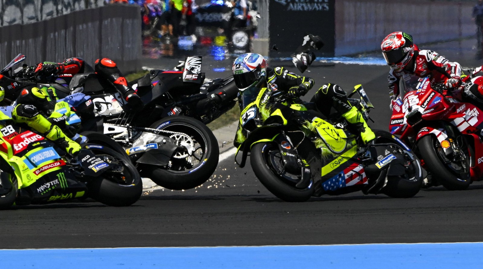 Bagnaia watches the Turn 1 accident unfold, 2026 Hungarian MotoGP.
