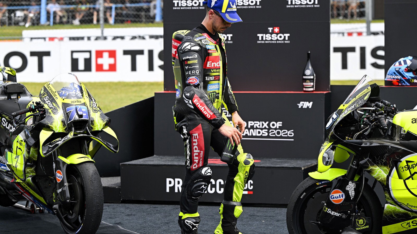 Fabio di Giannantonio looks at the Aprilia, 2026 Assen MotoGP Sprint. 2026 Assen MotoGP. 