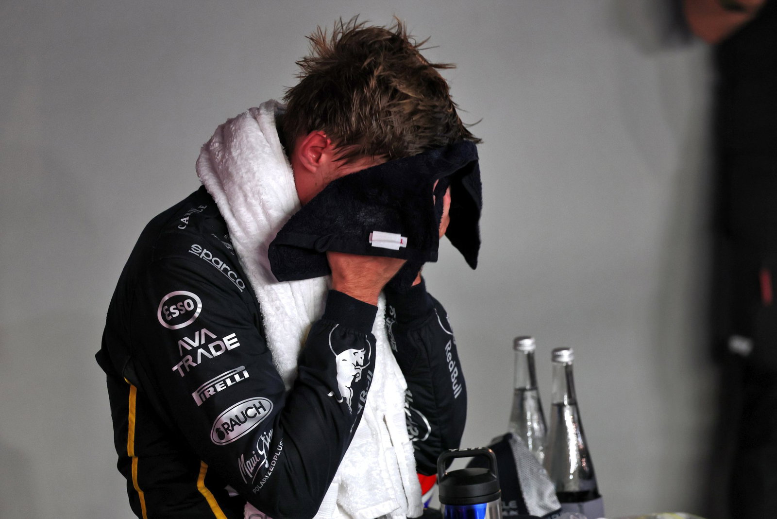 Verstappen towels down after a Heat Hazard race