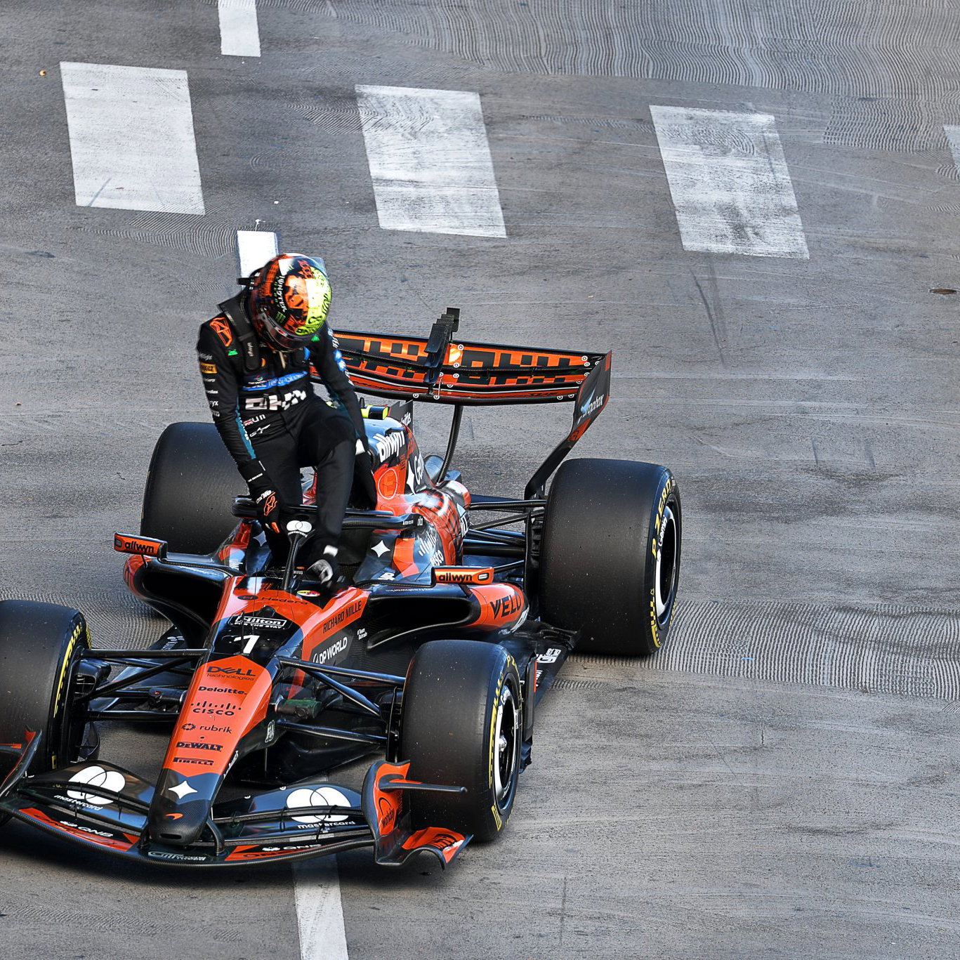 Norris climbs out of his stricken McLaren 