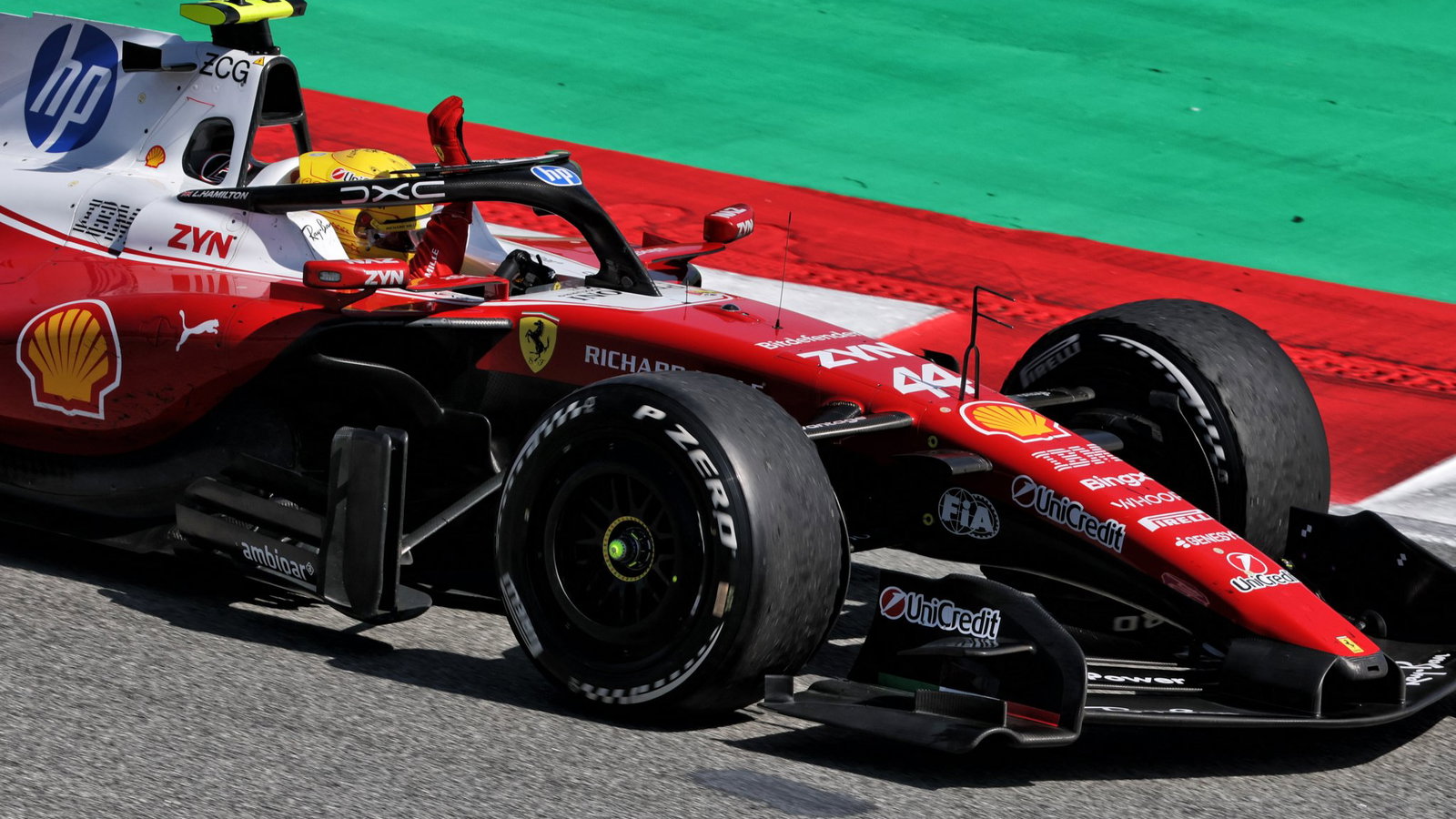 Hamilton celebrates his first win as a Ferrari driver