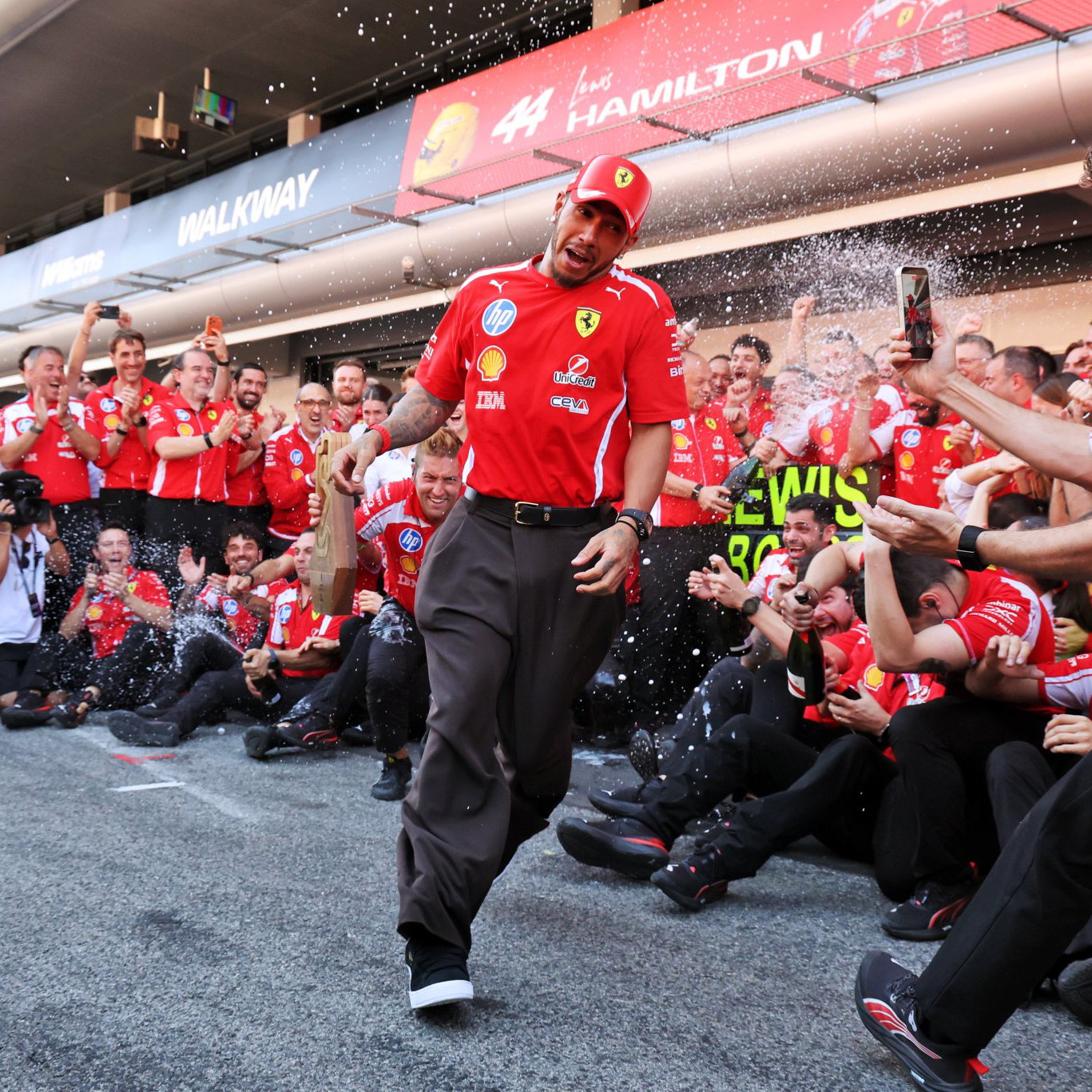 Ferrari celebrate Hamilton's first win in red