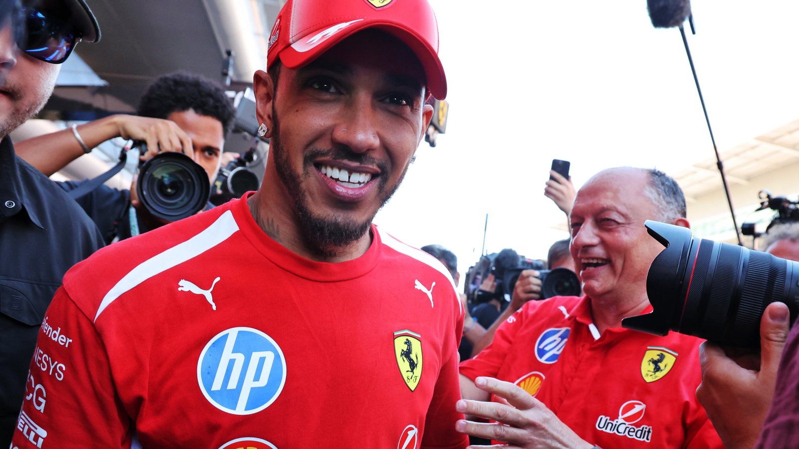 Hamilton celebrates his maiden win for Ferrari