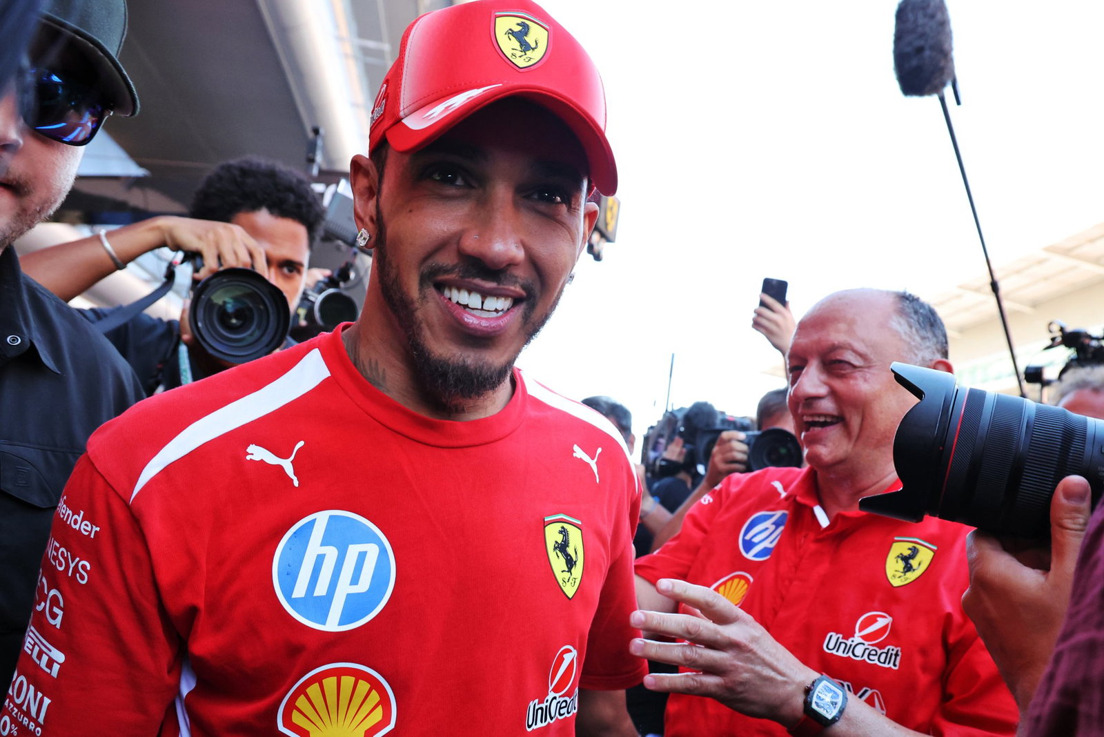 Hamilton celebrates his maiden win for Ferrari