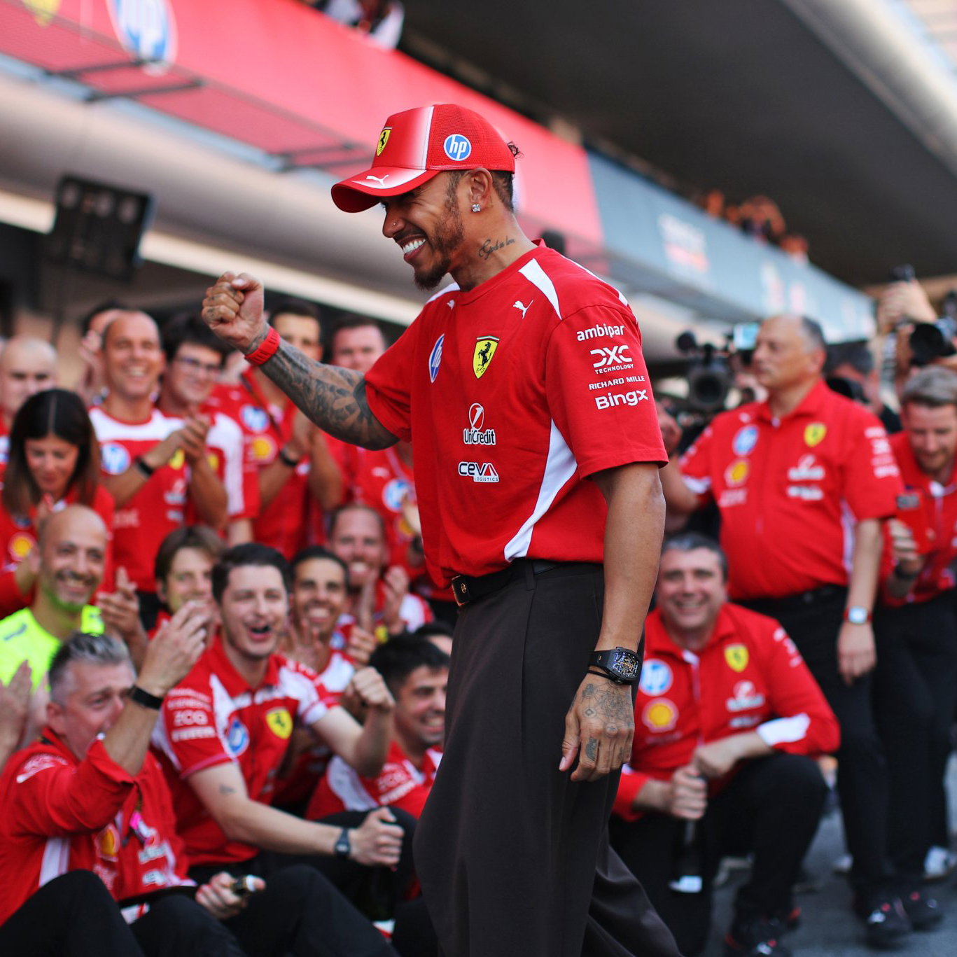 Hamilton celebrates his first win with his Ferrari team 