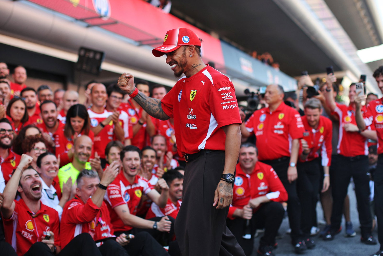 Hamilton celebrates his first win with his Ferrari team